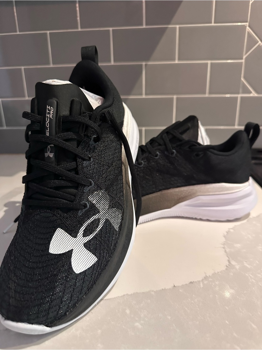 Under Armour Velocity Pro Black and White Running Shoes women’s 10/mens 8.5